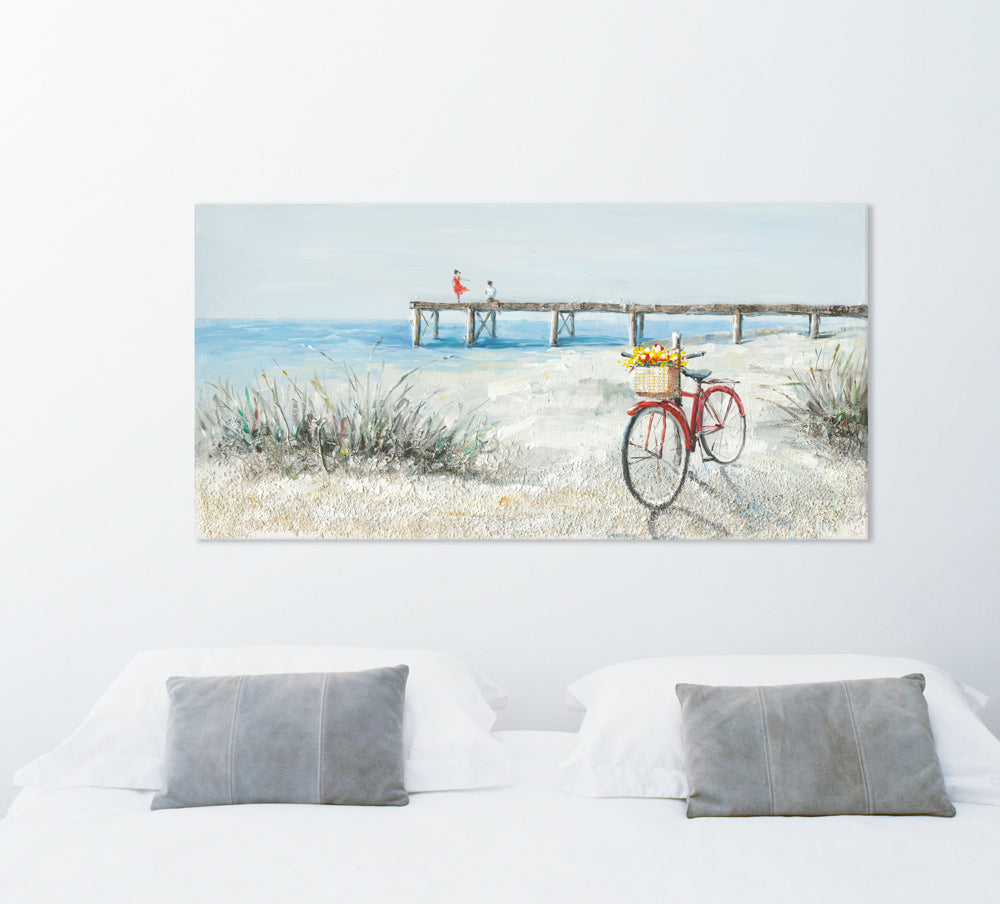 Rotes Fahrrad am Strand