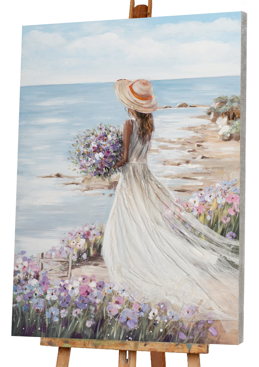 Frau am Strand mit weißem Kleid