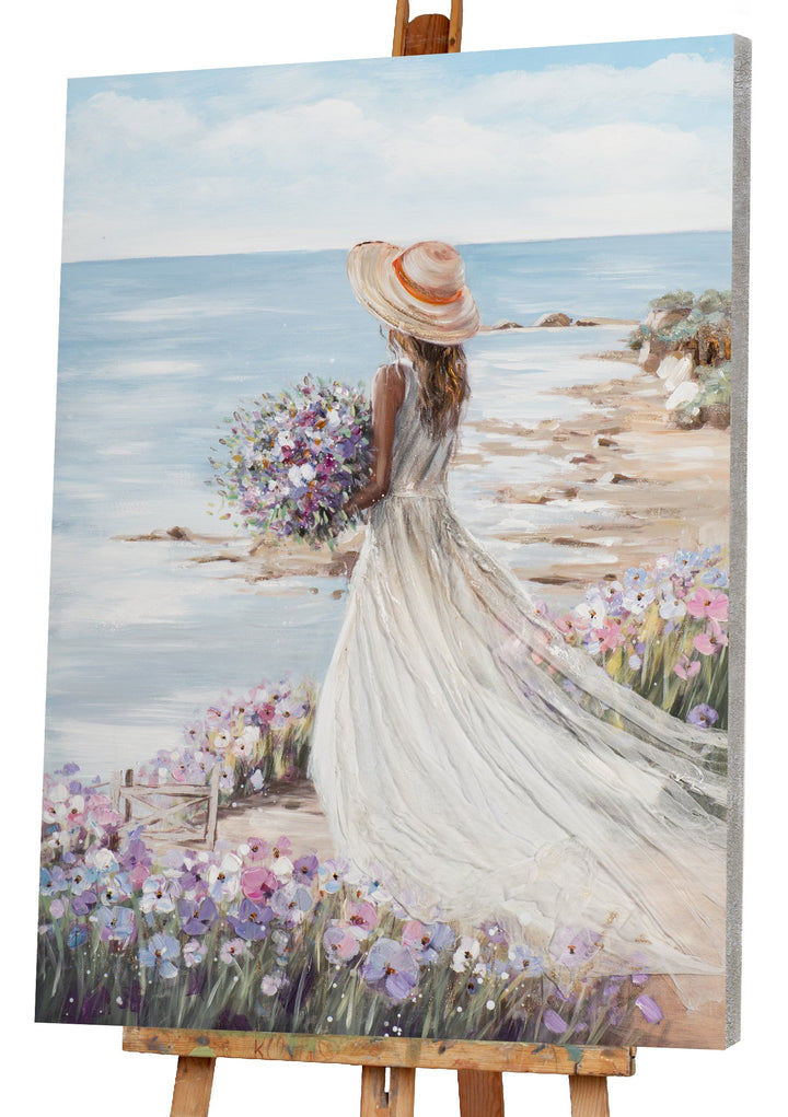 Frau am Strand mit weißem Kleid