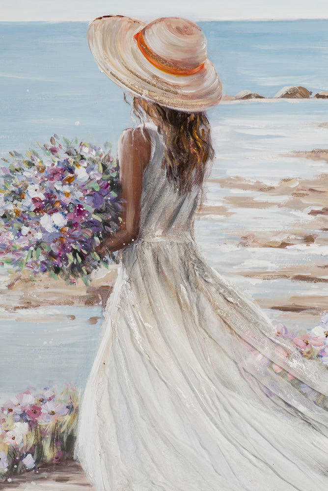 Frau am Strand mit weißem Kleid