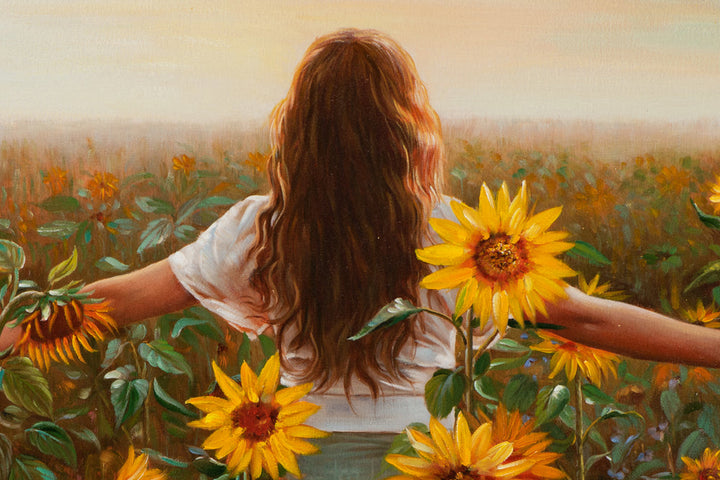 Frau im Sonnenblumenfeld